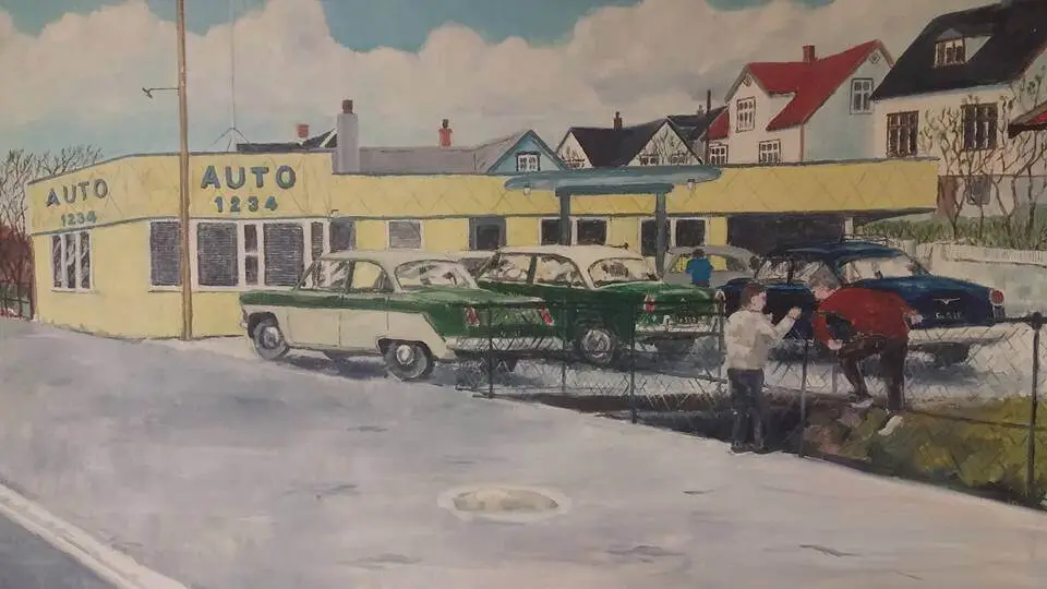 A painted illustration of a mid-20th-century auto garage with a yellow building labeled "AUTO 1234." Several classic cars are parked in front, while two children interact by a chain-link fence. Colorful houses line the background under a blue sky with fluffy clouds, giving the image a nostalgic, peaceful atmosphere.